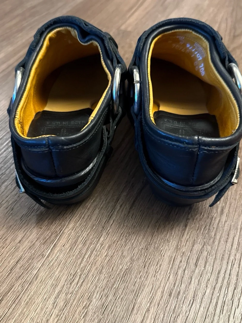 Frye Black leather belted shoe buckle shoes with yellow lining. Size 6M